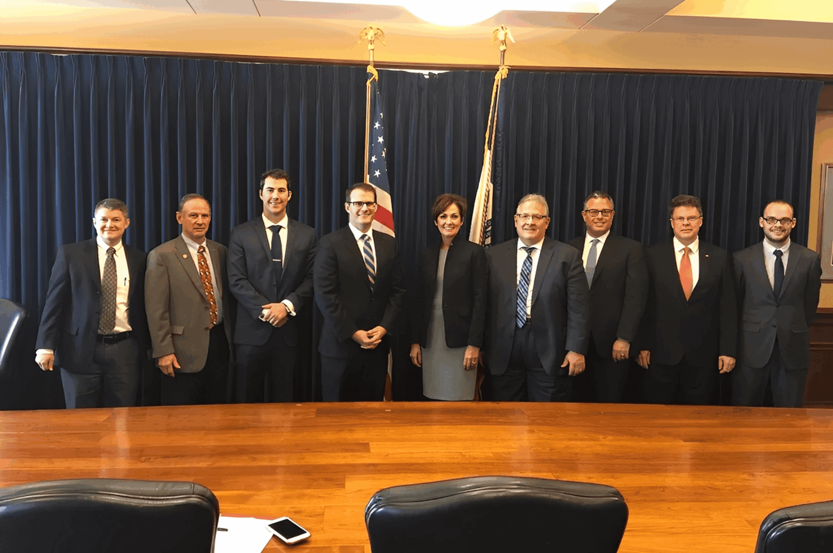 Group of people in a formal meeting.